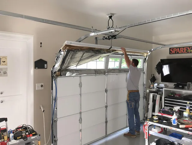 Garage door section replacement by Seymour Garage Door Repair in Seymour