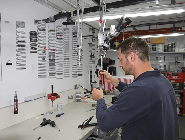 Seymour Garage Door Repair safety certified technician performing precision spring replacement in Seymour